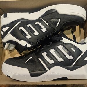 Adidas Black and White Midcity Basketball Sneakers.